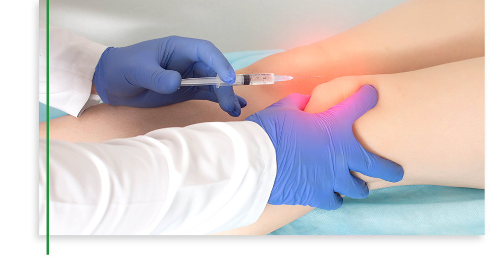 person getting injection in knee