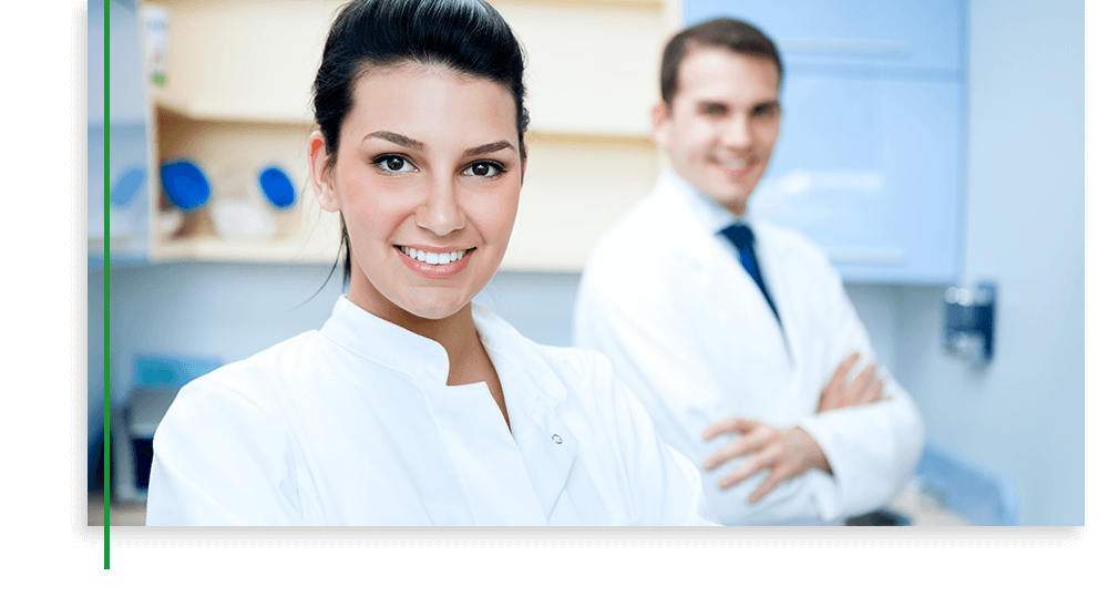 2 doctors smiling at camera